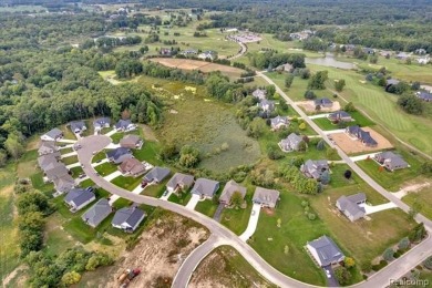 Skip the hassle of building and move right into this like-new on Metamora Country Club in Michigan - for sale on GolfHomes.com, golf home, golf lot