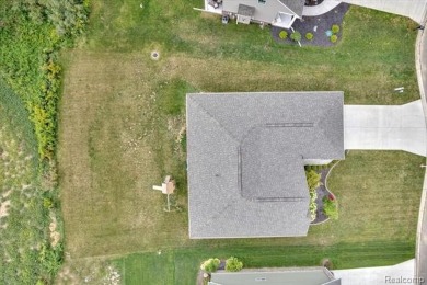 Skip the hassle of building and move right into this like-new on Metamora Country Club in Michigan - for sale on GolfHomes.com, golf home, golf lot