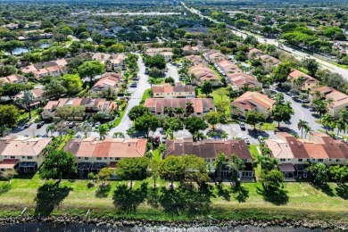 3/2.5 townhouse with attached garage with very low HOA located on Deer Creek Golf Club in Florida - for sale on GolfHomes.com, golf home, golf lot