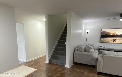 Charming and inviting townhome located in the desirable Fleming on Golf Club At Fleming Island in Florida - for sale on GolfHomes.com, golf home, golf lot