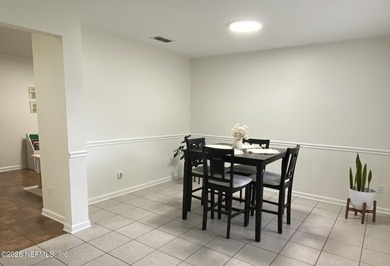 Charming and inviting townhome located in the desirable Fleming on Golf Club At Fleming Island in Florida - for sale on GolfHomes.com, golf home, golf lot