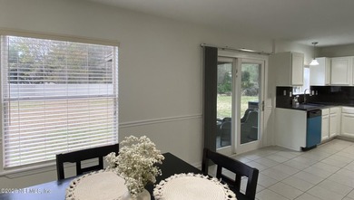 Charming and inviting townhome located in the desirable Fleming on Golf Club At Fleming Island in Florida - for sale on GolfHomes.com, golf home, golf lot