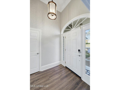 Welcome to 513 Windsor Drive, nestled in the heart of the highly on Castlewoods Golf Club in Mississippi - for sale on GolfHomes.com, golf home, golf lot