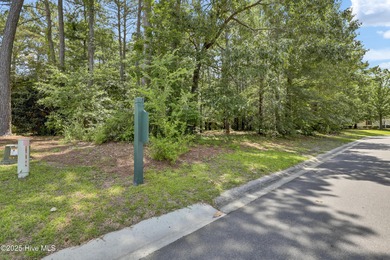 Residential parcel with mature trees set along the 3rd fairway on River Landing Golf Course in North Carolina - for sale on GolfHomes.com, golf home, golf lot