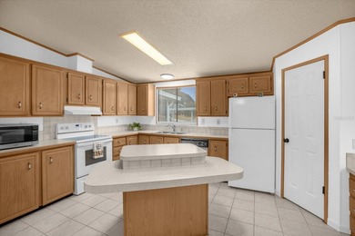 This Extra Clean, Bright home features 3 1/2 yrs old A/C, Metal on Zellwood Station Country Club in Florida - for sale on GolfHomes.com, golf home, golf lot