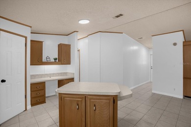 This Extra Clean, Bright home features 3 1/2 yrs old A/C, Metal on Zellwood Station Country Club in Florida - for sale on GolfHomes.com, golf home, golf lot