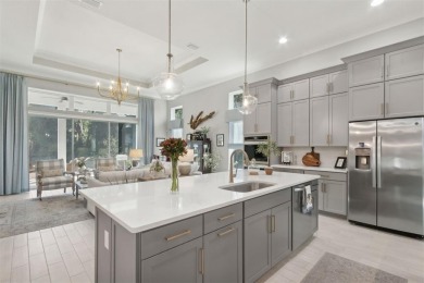 Stunning home within Amelia National, a resort style golf course on Amelia National Golf and Country Club in Florida - for sale on GolfHomes.com, golf home, golf lot