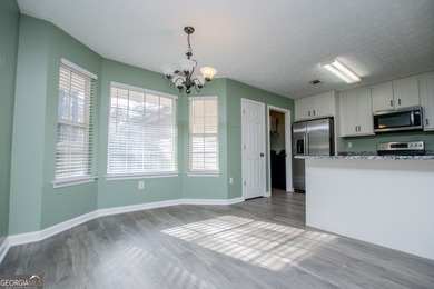 Live the Fairfield Plantation lifestyle! Stylish stepless ranch on Fairfield Plantation Golf and Country Club in Georgia - for sale on GolfHomes.com, golf home, golf lot