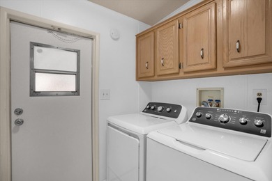 This Extra Clean, Bright home features 3 1/2 yrs old A/C, Metal on Zellwood Station Country Club in Florida - for sale on GolfHomes.com, golf home, golf lot