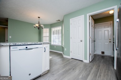 Live the Fairfield Plantation lifestyle! Stylish stepless ranch on Fairfield Plantation Golf and Country Club in Georgia - for sale on GolfHomes.com, golf home, golf lot