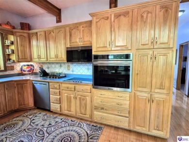 Discover this remarkable Lindal Cedar Home, thoughtfully crafted on Doe Valley Country Club in Kentucky - for sale on GolfHomes.com, golf home, golf lot