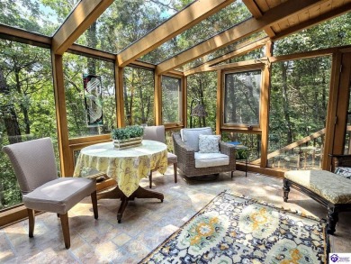 Discover this remarkable Lindal Cedar Home, thoughtfully crafted on Doe Valley Country Club in Kentucky - for sale on GolfHomes.com, golf home, golf lot