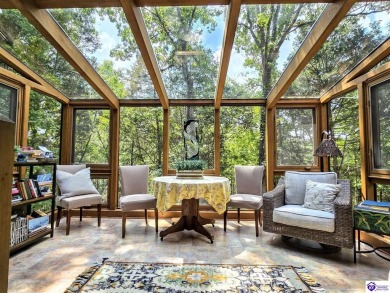 Discover this remarkable Lindal Cedar Home, thoughtfully crafted on Doe Valley Country Club in Kentucky - for sale on GolfHomes.com, golf home, golf lot