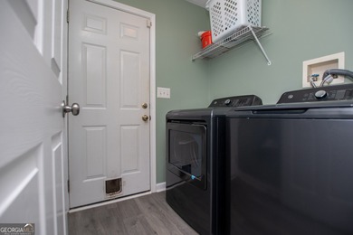 Live the Fairfield Plantation lifestyle! Stylish stepless ranch on Fairfield Plantation Golf and Country Club in Georgia - for sale on GolfHomes.com, golf home, golf lot