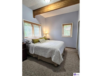 Discover this remarkable Lindal Cedar Home, thoughtfully crafted on Doe Valley Country Club in Kentucky - for sale on GolfHomes.com, golf home, golf lot