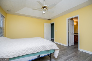 Live the Fairfield Plantation lifestyle! Stylish stepless ranch on Fairfield Plantation Golf and Country Club in Georgia - for sale on GolfHomes.com, golf home, golf lot