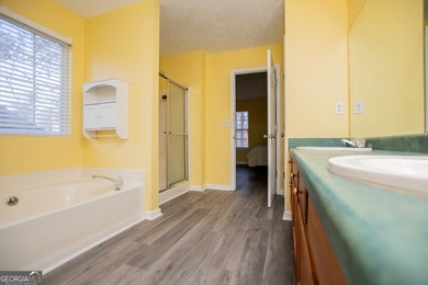 Live the Fairfield Plantation lifestyle! Stylish stepless ranch on Fairfield Plantation Golf and Country Club in Georgia - for sale on GolfHomes.com, golf home, golf lot