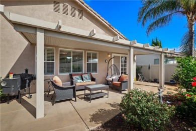 Discover the epitome of comfortable, carefree living in this on Menifee Lakes Country Club - Lakes in California - for sale on GolfHomes.com, golf home, golf lot