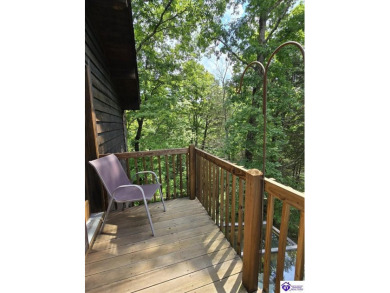 Discover this remarkable Lindal Cedar Home, thoughtfully crafted on Doe Valley Country Club in Kentucky - for sale on GolfHomes.com, golf home, golf lot