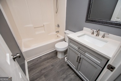 Live the Fairfield Plantation lifestyle! Stylish stepless ranch on Fairfield Plantation Golf and Country Club in Georgia - for sale on GolfHomes.com, golf home, golf lot