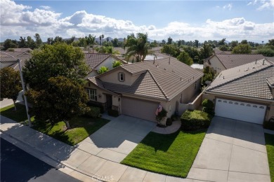 Discover the epitome of comfortable, carefree living in this on Menifee Lakes Country Club - Lakes in California - for sale on GolfHomes.com, golf home, golf lot