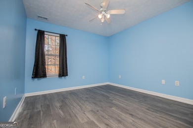 Live the Fairfield Plantation lifestyle! Stylish stepless ranch on Fairfield Plantation Golf and Country Club in Georgia - for sale on GolfHomes.com, golf home, golf lot