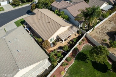 Discover the epitome of comfortable, carefree living in this on Menifee Lakes Country Club - Lakes in California - for sale on GolfHomes.com, golf home, golf lot