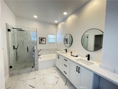 Experience luxurious living in this stunning tri-level townhome on Tustin Ranch Golf Club in California - for sale on GolfHomes.com, golf home, golf lot