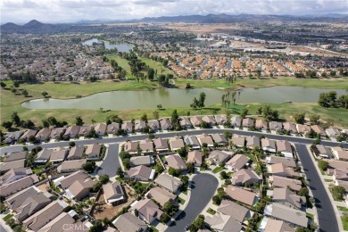 Discover the epitome of comfortable, carefree living in this on Menifee Lakes Country Club - Lakes in California - for sale on GolfHomes.com, golf home, golf lot