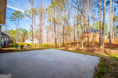Live the Fairfield Plantation lifestyle! Stylish stepless ranch on Fairfield Plantation Golf and Country Club in Georgia - for sale on GolfHomes.com, golf home, golf lot