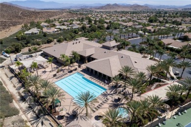 Discover the epitome of comfortable, carefree living in this on Menifee Lakes Country Club - Lakes in California - for sale on GolfHomes.com, golf home, golf lot