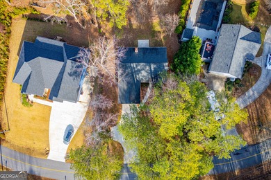 Live the Fairfield Plantation lifestyle! Stylish stepless ranch on Fairfield Plantation Golf and Country Club in Georgia - for sale on GolfHomes.com, golf home, golf lot