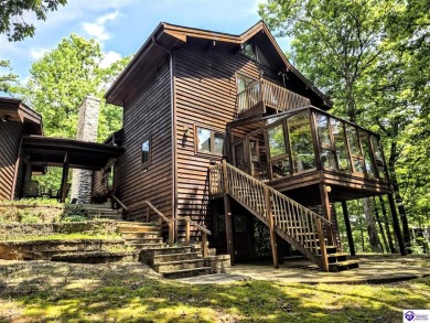 Discover this remarkable Lindal Cedar Home, thoughtfully crafted on Doe Valley Country Club in Kentucky - for sale on GolfHomes.com, golf home, golf lot
