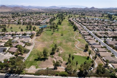 Discover the epitome of comfortable, carefree living in this on Menifee Lakes Country Club - Lakes in California - for sale on GolfHomes.com, golf home, golf lot