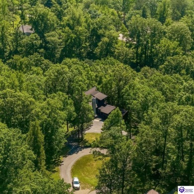 Discover this remarkable Lindal Cedar Home, thoughtfully crafted on Doe Valley Country Club in Kentucky - for sale on GolfHomes.com, golf home, golf lot