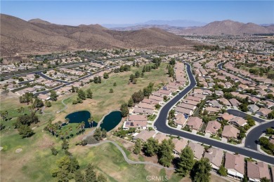 Discover the epitome of comfortable, carefree living in this on Menifee Lakes Country Club - Lakes in California - for sale on GolfHomes.com, golf home, golf lot