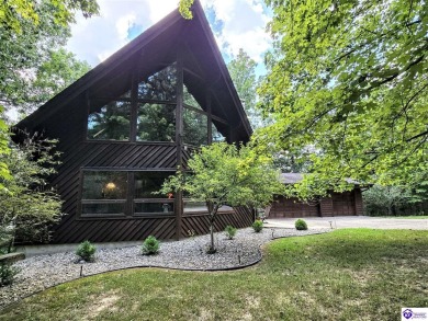 Discover this remarkable Lindal Cedar Home, thoughtfully crafted on Doe Valley Country Club in Kentucky - for sale on GolfHomes.com, golf home, golf lot