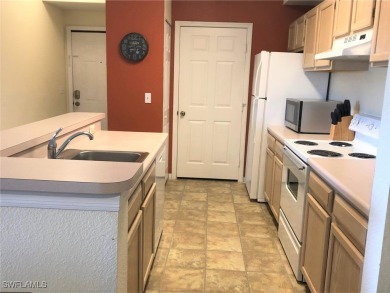 This 2 bedroom, 2 bathroom Third floor condo located close to on Gateway Golf and Country Club in Florida - for sale on GolfHomes.com, golf home, golf lot