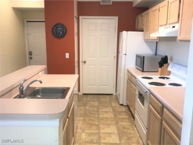 This 2 bedroom, 2 bathroom Third floor condo located close to on Gateway Golf and Country Club in Florida - for sale on GolfHomes.com, golf home, golf lot