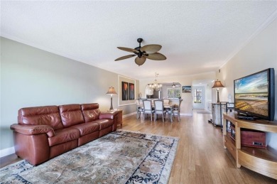Step into paradise in this beautifully appointed 1st floor 2 on Royal Wood Golf and Country Club in Florida - for sale on GolfHomes.com, golf home, golf lot