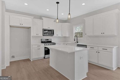Featuring the *Travis floor plan* features 4 bedrooms, 2.5 baths on The Plantation Golf Club in Georgia - for sale on GolfHomes.com, golf home, golf lot