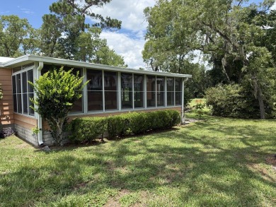 Ready to Renovate! Situated on a beautiful golf course lot in on Rolling Greens Executive Golf Community in Florida - for sale on GolfHomes.com, golf home, golf lot