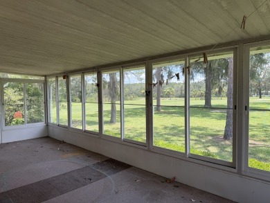 Ready to Renovate! Situated on a beautiful golf course lot in on Rolling Greens Executive Golf Community in Florida - for sale on GolfHomes.com, golf home, golf lot