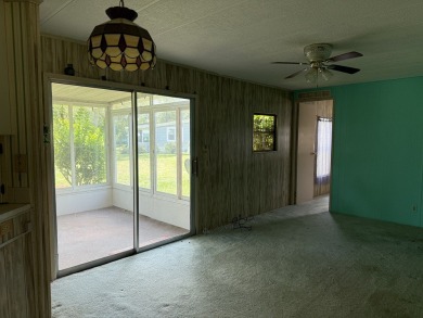 Ready to Renovate! Situated on a beautiful golf course lot in on Rolling Greens Executive Golf Community in Florida - for sale on GolfHomes.com, golf home, golf lot