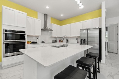 Stunning Key West Style Home that Blends Modern Luxury with on Reunion Resort Golf Course in Florida - for sale on GolfHomes.com, golf home, golf lot