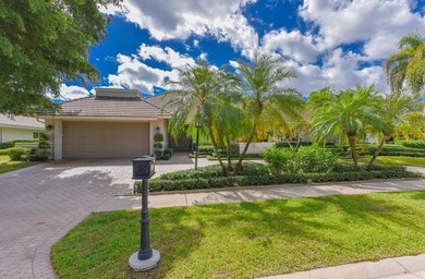 This elegantly remodeled contemporary pool home is located in on Boca Grove Golf and Tennis in Florida - for sale on GolfHomes.com, golf home, golf lot