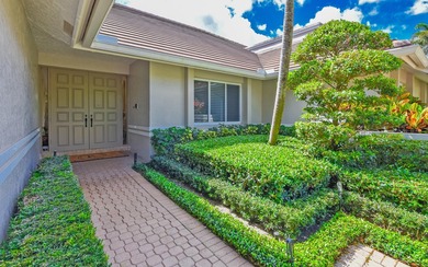 This elegantly remodeled contemporary pool home is located in on Boca Grove Golf and Tennis in Florida - for sale on GolfHomes.com, golf home, golf lot