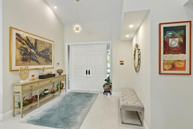 This elegantly remodeled contemporary pool home is located in on Boca Grove Golf and Tennis in Florida - for sale on GolfHomes.com, golf home, golf lot