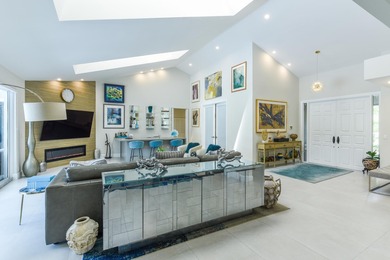This elegantly remodeled contemporary pool home is located in on Boca Grove Golf and Tennis in Florida - for sale on GolfHomes.com, golf home, golf lot