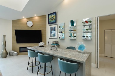 This elegantly remodeled contemporary pool home is located in on Boca Grove Golf and Tennis in Florida - for sale on GolfHomes.com, golf home, golf lot